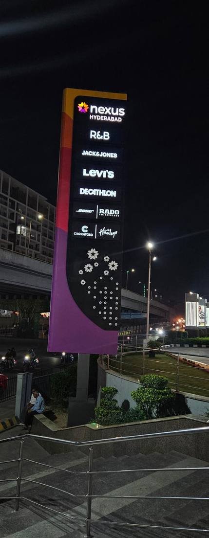 Nexus Hyderabad illuminated pylon at night