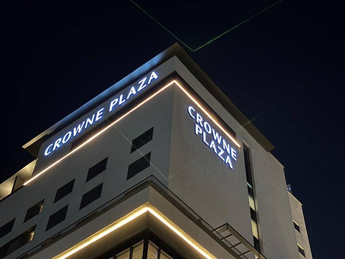 Radisson Resort and Spa Khopoli illuminated sign at night
