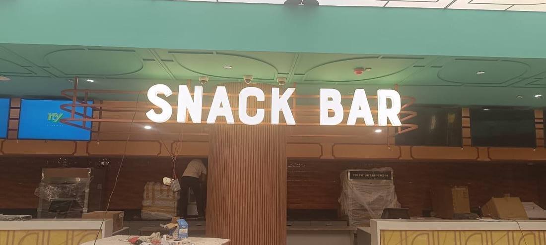 Snack Bar illuminated letters at cinema